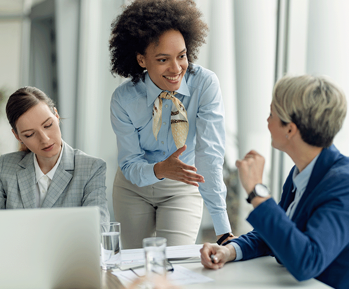 3 women discussing about Abundance Business & Tax Services